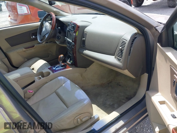 2006 Cadillac CTS z VIN 1G6DP577X60108313, wystawiony jako IAAI lot #42223144 z przebiegiem 98 329 mil mil oraz . Historia ofert i sprzedaży dostępna na DreamBid. Obrazek 5.