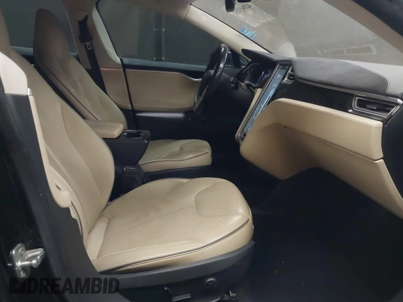 2014 Tesla Model S 60 with VIN 5YJSA1H11EFP56406, listed as a IAAI auction lot 42065157 with Not Provided miles and . Bid and sale history available at DreamBid. Image 5.