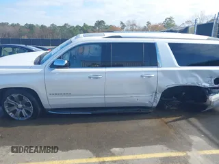 2019 Chevrolet Suburban LT with VIN 1GNSCJKC1KR146104, listed as a IAAI auction lot 41103371 with 108,727 mi miles. Bid and sale history available at carsss.com. Image 14.