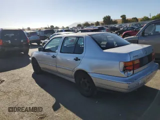 1998 Volkswagen Jetta z VIN 3VWRB81HXWM136725, wystawiony jako Copart lot #71419064 z przebiegiem 160 685 mil mil oraz Szkoda całkowita • Salvage title. Historia ofert i sprzedaży dostępna na DreamBid. Obrazek 2.