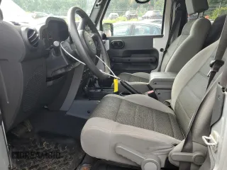 2007 Jeep Wrangler X with VIN 1J4FA24117L202404, listed as a Copart auction lot 58690485 with 126,347 mi miles and Salvage title. Bid and sale history available at DreamBid. Image 7.