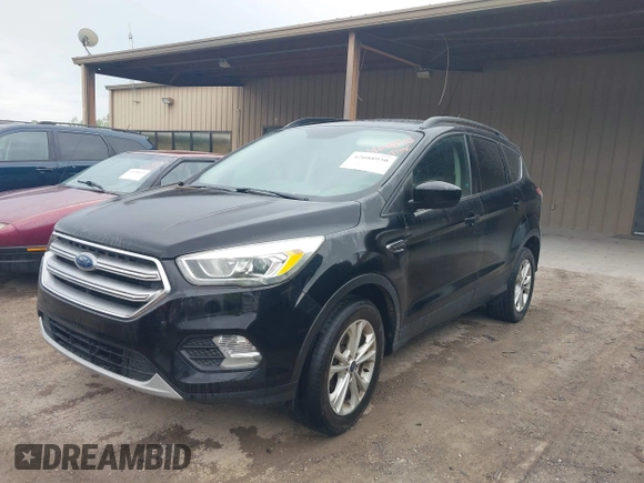 2017 Ford Escape SE with VIN 1FMCU9GD6HUB90367, listed as a IAAI auction lot 42088930 with 145,286 mi miles and . Bid and sale history available at DreamBid. Image 17.
