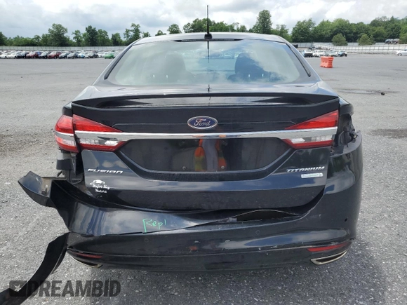2017 Ford Fusion Titanium z VIN 3FA6P0K92HR192881, wystawiony jako Copart lot #61190515 z przebiegiem 109 834 mil mil oraz Szkoda całkowita • Salvage title. Historia ofert i sprzedaży dostępna na DreamBid. Obrazek 6.