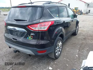 2013 Ford Escape SEL z VIN 1FMCU9H98DUB78564, wystawiony jako IAAI lot #42381290 z przebiegiem 89 728 mil mil oraz . Historia ofert i sprzedaży dostępna na DreamBid. Obrazek 4.