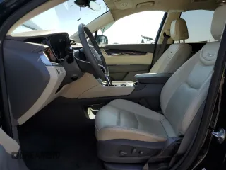 2024 Cadillac XT6 FWD Premium Luxury with VIN 1GYKPCRS7RZ737726, listed as a Copart auction lot 47471965 with 7,974 mi miles and Salvage Title. Bid and sale history available at carsss.com. Image 7.