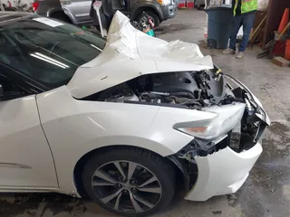 2016 Nissan Maxima SL z VIN 1N4AA6APXGC383444, wystawiony jako IAAI lot #41766069 z przebiegiem 92 629 mil mil oraz . Historia ofert i sprzedaży dostępna na DreamBid. Obrazek 19.