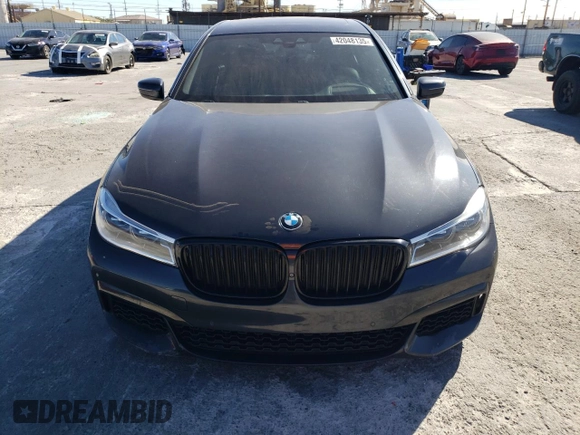 2019 BMW 7 Series 750i with VIN WBA7F0C56KGM25430, listed as a Copart auction lot 42048135 with 74,717 mi miles and Salvage title. Bid and sale history available at DreamBid. Image 5.