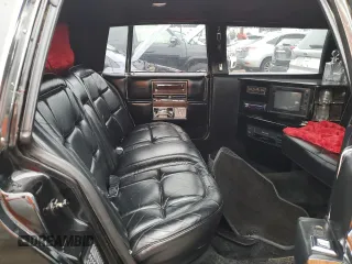 1986 Cadillac Fleetwood z VIN 1G6DW69YXG9739705, wystawiony jako Copart lot #74947294 z przebiegiem 53 213 mil mil oraz Nie do naprawy. Historia ofert i sprzedaży dostępna na DreamBid. Obrazek 10.