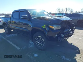 2021 Toyota Tacoma 4WD SR5 with VIN 3TMDZ5BN4MM117564, listed as a IAAI auction lot 41629220 with 77,063 mi miles. Bid and sale history available at carsss.com. Image 1.
