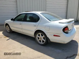 2000 Nissan Maxima GXE z VIN JN1CA31D3YT537410, wystawiony jako Copart lot #68046964 z przebiegiem 313 180 mil mil oraz Czysty tytuł • Clean title. Historia ofert i sprzedaży dostępna na DreamBid. Obrazek 2.