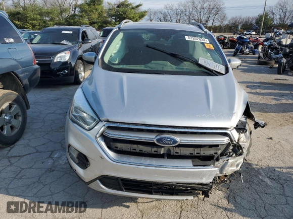 2017 Ford Escape Titanium with VIN 1FMCU9J95HUA48080, listed as a Copart auction lot 83202034 with 122,528 mi miles and Salvage Title. Bid and sale history available at carsss.com. Image 5.