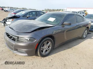 2015 Dodge Charger SE with VIN 2C3CDXBG6FH843746, listed as a IAAI auction lot 41859006 with 113,964 mi miles and . Bid and sale history available at carsss.com. Image 2.