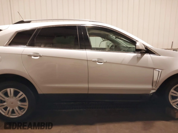 2016 Cadillac SRX Luxury Collection with VIN 3GYFNEE3XGS566210, listed as a IAAI auction lot 42094984 with 99,671 mi miles and . Bid and sale history available at DreamBid. Image 13.