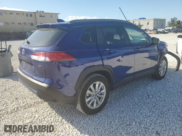 2023 Toyota Corolla Cross LE with VIN 7MUCAAAG0PV063737, listed as a Copart auction lot 86267914 with 13,740 mi miles and Salvage title. Bid and sale history available at DreamBid. Image 3.