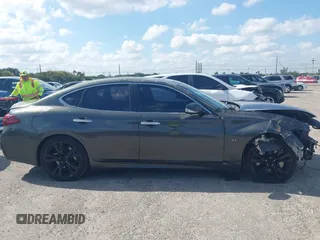 2013 Infiniti M37 with VIN JN1BY1AP8DM511850, listed as a IAAI auction lot 42063120 with 111,545 mi miles. Bid and sale history available at carsss.com. Image 14.
