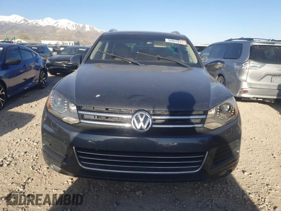 2012 Volkswagen Touareg Sport z VIN WVGFK9BP6CD001309, wystawiony jako Copart lot #52827875 z przebiegiem 153 250 mil mil oraz Czysty tytuł • Clean title. Historia ofert i sprzedaży dostępna na DreamBid. Obrazek 5.