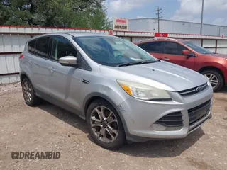 2013 Ford Escape SEL with VIN 1FMCU9H95DUA48886, listed as a IAAI auction lot 42117937 with 244,101 mi miles. Bid and sale history available at carsss.com. Image 1.