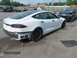 2022 Tesla Model S with VIN 5YJSA1E57NF462175, listed as a IAAI auction lot 42231439 with Not provided miles and . Bid and sale history available at DreamBid. Image 4.