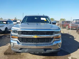 2018 Chevrolet Silverado 1500 LT with VIN 3GCPCREC9JG574686, listed as a IAAI auction lot 41676124 with 74,239 mi miles and . Bid and sale history available at DreamBid. Image 12.