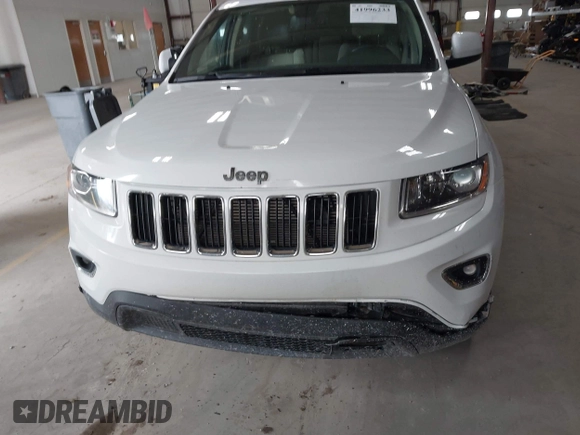 2014 Jeep Grand Cherokee Laredo with VIN 1C4RJFAG4EC309401, listed as a IAAI auction lot 41996233 with 243,541 mi miles and . Bid and sale history available at DreamBid. Image 12.