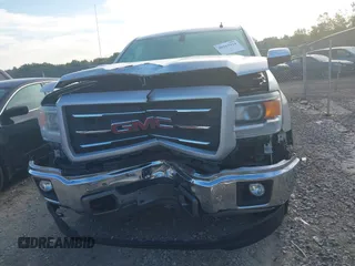 2014 GMC Sierra 1500 SLT with VIN 3GTU2VEC2EG100051, listed as a IAAI auction lot 40363924 with 149,636 mi miles and . Bid and sale history available at DreamBid. Image 13.