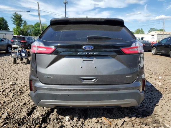 2024 Ford Edge SEL z VIN 2FMPK4J90RBA77908, wystawiony jako Copart lot #57846315 z przebiegiem 18 990 mil mil oraz Nie do naprawy. Historia ofert i sprzedaży dostępna na DreamBid. Obrazek 6.