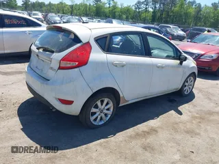 2013 Ford Fiesta SE with VIN 3FADP4EJ0DM109816, listed as a IAAI auction lot 42119360 with 164,397 mi miles and . Bid and sale history available at DreamBid. Image 4.