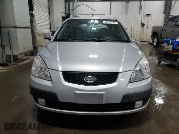 2009 Kia Rio LX with VIN KNADE243196496923, listed as a Copart auction lot 44235725 with 103,171 mi miles and Salvage Title. Bid and sale history available at carsss.com. Image 5.