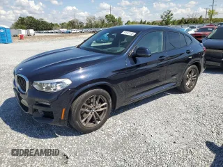 2021 BMW X4 xDrive30i z VIN 5UX2V1C09M9G11692, wystawiony jako Copart lot #51512115 z przebiegiem 16 948 mil mil oraz Szkoda całkowita • Salvage title. Historia ofert i sprzedaży dostępna na DreamBid. Obrazek 1.
