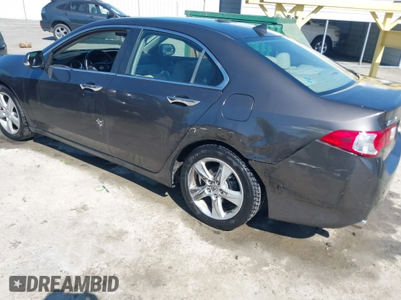2010 Acura TSX with VIN JH4CU2F63AC003630, listed as a IAAI auction lot 42002216 with 131,244 mi miles. Bid and sale history available at carsss.com. Image 6.