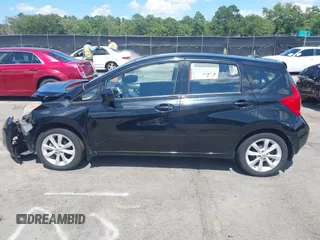 2015 Nissan Note SV z VIN 3N1CE2CP8FL386913, wystawiony jako IAAI lot #42531472 z przebiegiem 112 866 mil mil oraz . Historia ofert i sprzedaży dostępna na DreamBid. Obrazek 14.