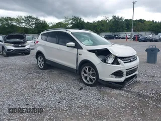 2014 Ford Escape Titanium с VIN 1FMCU0J9XEUA81566, выставлен на аукционе IAAI как лот 42476931 с пробегом 132 310 миль миль и . История ставок и продаж доступна на DreamBid. Изображение 1.
