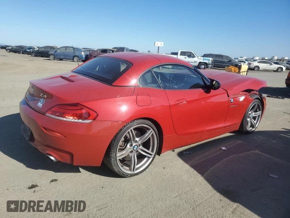 2012 BMW Z4 sDrive35is with VIN WBALM1C58CE633610, listed as a Copart auction lot 42824955 with 84,901 mi miles and Salvage title. Bid and sale history available at DreamBid. Image 3.