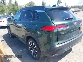 2023 Toyota Corolla Cross XLE with VIN 7MUEAAAG6PV052816, listed as a IAAI auction lot 42386639 with 42,736 mi miles and . Bid and sale history available at DreamBid. Image 3.