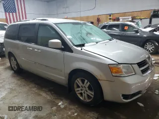 2010 Dodge Grand Caravan Crew with VIN 2D4RN6DX9AR390514, listed as a Copart auction lot 50906305 with 102,729 mi miles and Clean Title. Bid and sale history available at DreamBid. Image 4.