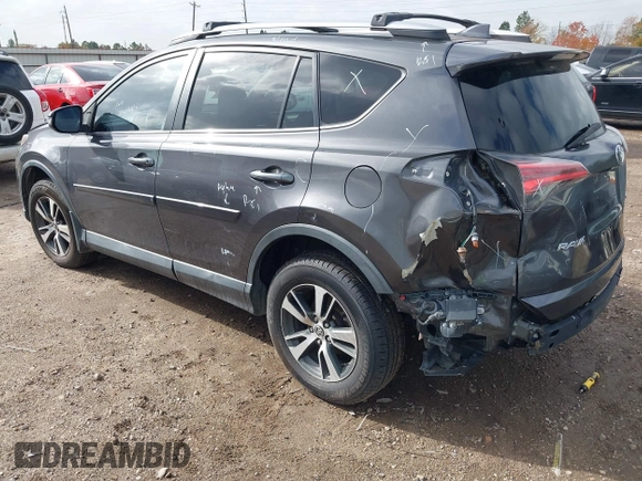 2018 Toyota RAV4 XLE with VIN 2T3WFREV4JW417555, listed as a IAAI auction lot 41092589 with 93,788 mi miles and . Bid and sale history available at DreamBid. Image 3.
