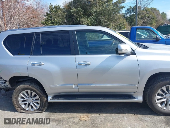 2015 Lexus GX 460 with VIN JTJBM7FX3F5115775, listed as a IAAI auction lot 41669011 with 111,658 mi miles and . Bid and sale history available at carsss.com. Image 13.