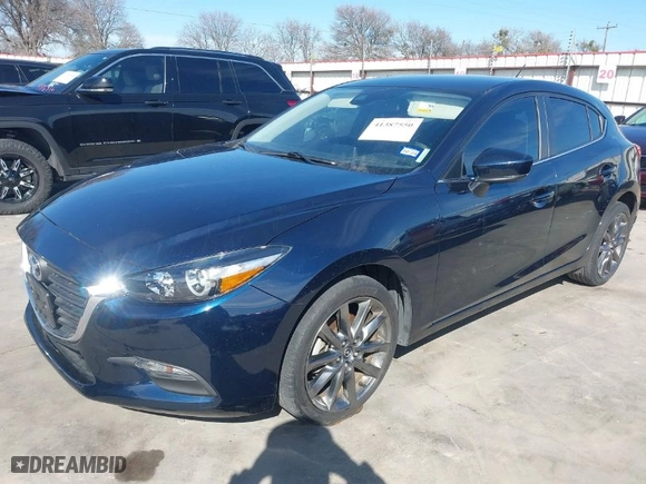 2018 Mazda Mazda3 5-Door Touring with VIN 3MZBN1L37JM272319, listed as a IAAI auction lot 41387550 with 21,376 mi miles. Bid and sale history available at carsss.com. Image 2.