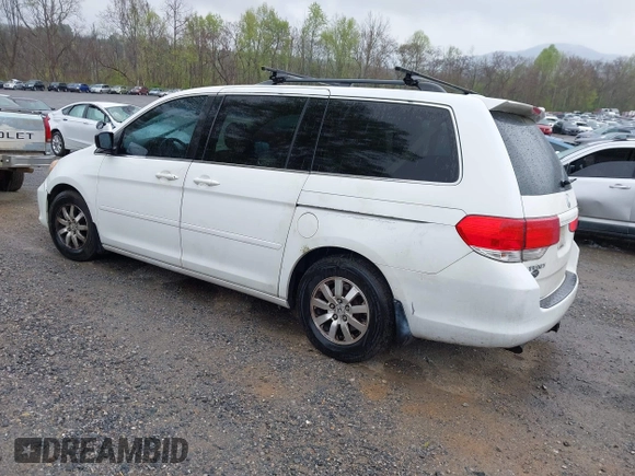 2010 Honda Odyssey EX-L with VIN 5FNRL3H65AB068497, listed as a IAAI auction lot 42013925 with 206,668 mi miles. Bid and sale history available at carsss.com. Image 3.