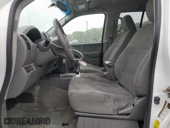 2018 Nissan Frontier SV with VIN 1N6AD0EV5JN744725, listed as a Copart auction lot 57601215 with 61,718 mi miles and Salvage title. Bid and sale history available at DreamBid. Image 7.