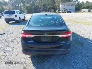 2018 Ford Fusion SE with VIN 3FA6P0LU7JR138906, listed as a IAAI auction lot 41573985 with 127,660 mi miles and . Bid and sale history available at DreamBid. Image 16.