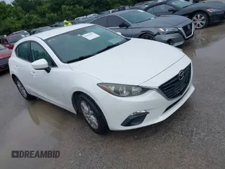 2014 Mazda 3 i Touring z VIN JM1BM1L73E1101014, wystawiony jako IAAI lot #42472127 z przebiegiem 121 426 mil mil oraz . Historia ofert i sprzedaży dostępna na DreamBid. Obrazek 1.