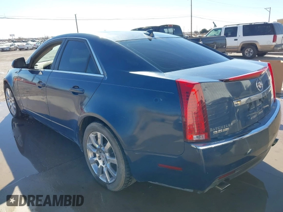 2009 Cadillac CTS RWD with VIN 1G6DV57V990146995, listed as a IAAI auction lot 41209631 with 172,229 mi miles and . Bid and sale history available at carsss.com. Image 3.