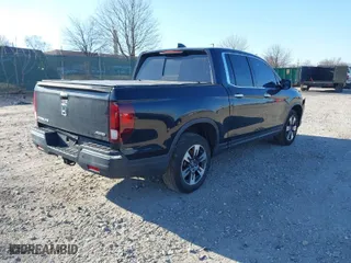 2019 Honda Ridgeline RTL-E with VIN 5FPYK3F7XKB033652, listed as a IAAI auction lot 41751421 with 96,774 mi miles. Bid and sale history available at carsss.com. Image 4.