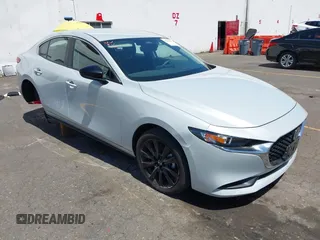 2024 Mazda 3 S Select Sport with VIN 3MZBPABM8RM437245, listed as a IAAI auction lot 42338599 with 238 mi miles and . Bid and sale history available at DreamBid. Image 1.