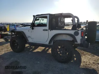 2010 Jeep Wrangler Sport with VIN 1J4AA2D16AL144842, listed as a Copart auction lot 50173535 with 106,000 mi miles and Salvage Title. Bid and sale history available at carsss.com. Image 2.