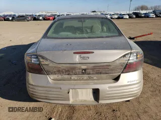 2003 Pontiac Bonneville SE z VIN 1G2HX52K834126392, wystawiony jako Copart lot #43009704 z przebiegiem 231 223 mil mil oraz Szkoda całkowita • Salvage title. Historia ofert i sprzedaży dostępna na DreamBid. Obrazek 6.