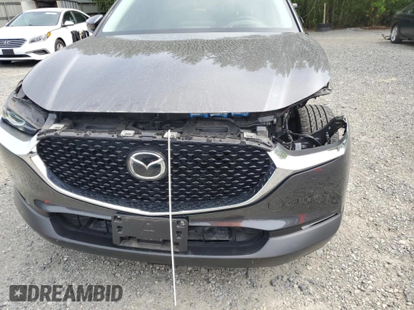 2020 Mazda CX-30 Premium с VIN 3MVDMBEM3LM108741, выставлен на аукционе Copart как лот 62100745 с пробегом 16 307 миль миль и Списание • Salvage title. История ставок и продаж доступна на DreamBid. Изображение 12.