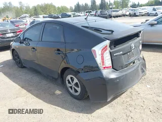 2015 Toyota Prius Four with VIN JTDKN3DU8F1984610, listed as a IAAI auction lot 42165175 with 128,803 mi miles and . Bid and sale history available at DreamBid. Image 3.