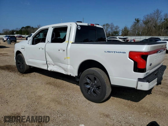 2022 Ford F-150 Lightning Pro z VIN 1FT6W1EV6NWG01209, wystawiony jako Copart lot #45301935 z przebiegiem 25 141 mil mil oraz Szkody całkowita. Historia ofert i sprzedaży dostępna na DreamBid. Obrazek 2.